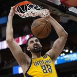 
              Indiana Pacers' Goga Bitadze (88) dunks the ball against the Houston Rockets during the first half of an NBA basketball game Friday, March 18, 2022, in Houston. (AP Photo/David J. Phillip)
            