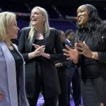 
              Missouri State coach Amaka Agugua-Hamilton, right, talks with Florida State coach Sue Semrau, left, and Florida State associate head coach Brooke Wyckoff, center, before a First Four game in the NCAA women's college basketball tournament Thursday, March 17, 2022, in Baton Rouge, La. (AP Photo/Matthew Hinton)
            