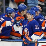 
              New York Islanders' Mathew Barzal (13) is congratulated for his goal during the third period of the team's NHL hockey game against the Columbus Blue Jackets on Thursday, March 31, 2022, in Elmont, N.Y. The Islanders won 5-2. (AP Photo/Frank Franklin II)
            