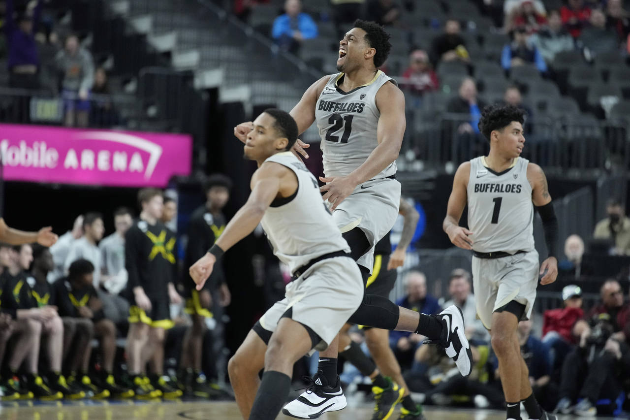 Colorado's Evan Battey (21) celebrates after a play against Oregon during the first half of an NCAA...