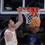 
              Tennessee forward John Fulkerson dunks the ball during the first half of a college basketball game against Longwood in the first round of the NCAA tournament in Indianapolis, Thursday, March 17, 2022. (AP Photo/Michael Conroy)
            