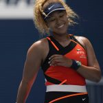
              Naomi Osaka of Japan reacts after losing a point in her first round women's match against Astra Sharma of Australia, at the Miami Open tennis tournament, Wednesday, March 23, 2022, in Miami Gardens, Fla. (AP Photo/Rebecca Blackwell)
            