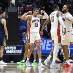 
              Texas Tech guard Kevin McCullar (15) reacts with teammates during the first half of a second-round NCAA college basketball tournament game against Notre Dame, Sunday, March 20, 2022, in San Diego. (AP Photo/Denis Poroy)
            