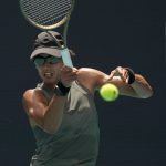 
              Astra Sharma of Australia returns a ball in her first round women's match against Naomi Osaka of Japan, at the Miami Open tennis tournament, Wednesday, March 23, 2022, in Miami Gardens, Fla. (AP Photo/Rebecca Blackwell)
            