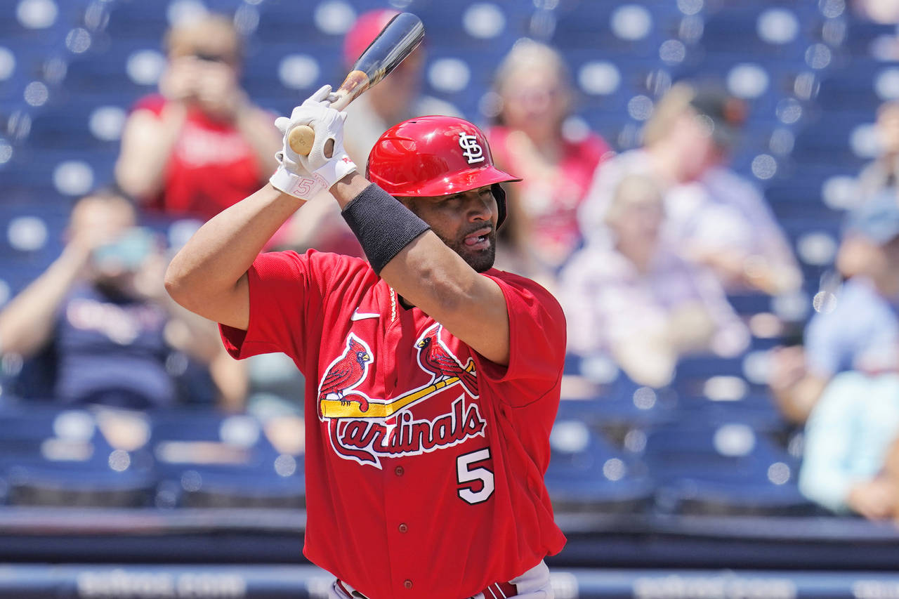 St. Louis Cardinals' Albert Pujols (5) bats in the first inning of a spring training baseball game ...