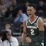 
              Michigan State's Tyson Walker reacts after Michigan State defeated Wisconsin in an NCAA college basketball game at the Big Ten Conference men's tournament Friday, March 11, 2022, in Indianapolis. (AP Photo/Darron Cummings)
            