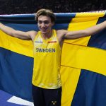 
              Armand Duplantis, of Sweden, poses after setting a new world record at the end of the Men's pole vault at the World Athletics Indoor Championships in Belgrade, Serbia, Sunday, March 20, 2022. (AP Photo/Darko Vojinovic)
            