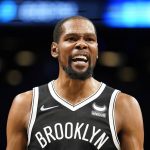 
              Brooklyn Nets forward Kevin Durant reacts to a referee call in the first half of an NBA basketball game against the Dallas Mavericks, Wednesday, March 16, 2022, in New York. (AP Photo/John Minchillo)
            