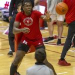 
              Rutgers center Clifford Omoruyi (11) warms up on the court before an NCAA college basketball game against Indiana, Wednesday, March 2, 2022, in Bloomington, Ind. (AP Photo/Doug McSchooler)
            
