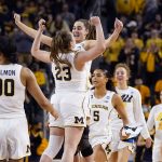 
              Michigan guard Danielle Rauch (23) and guard Amy Dilk react at the end of the college basketball game in the second round of the NCAA tournament against Villanova, Monday, March 21, 2022, in Ann Arbor, Mich. (AP Photo/Carlos Osorio)
            