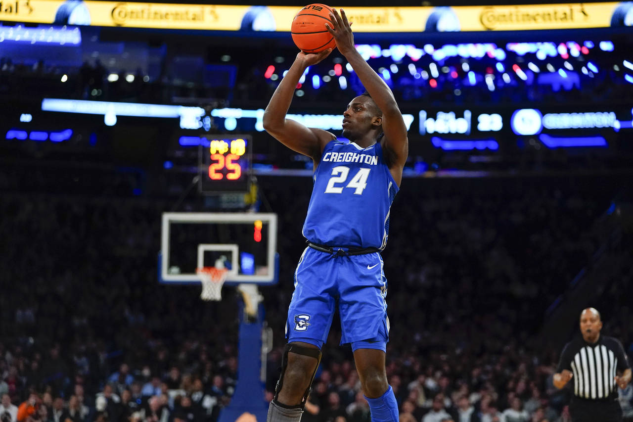 Creighton's Arthur Kaluma (24) shoots during the second half of an NCAA college basketball game aga...