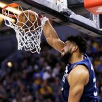 
              Minnesota Timberwolves center Karl-Anthony Towns dunks during the first half of the team's NBA basketball game against the Los Angeles Lakers on Wednesday, March 16, 2022, in Minneapolis. (AP Photo/Andy Clayton-King)
            