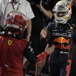 
              Ferrari driver Charles Leclerc of Monaco, left, shakes hands with Red Bull driver Max Verstappen of the Netherlands after the Formula One Grand Prix it in Jiddah, Saudi Arabia, Sunday, March 27, 2022. (AP Photo/Hassan Ammar)
            