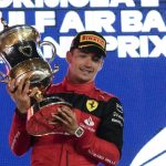 
              Ferrari driver Charles Leclerc of Monaco celebrates after he won the Formula One Bahrain Grand Prix it in Sakhir, Bahrain, Sunday, March 20, 2022. (AP Photo/Hassan Ammar)
            