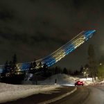 
              A view of Holmenkollen ski jumping hill lit up in the colors of the Ukrainian flag, to show support for Ukraine in light of Russia's invasion of the country, in Oslo, Monday, Feb. 28, 2022. Norway challenged a decision by the International Ski Federation to allow Russians to keep competing, and said it would block them from upcoming rounds of the World Cup that Norway hosts this week.  (Terje Pedersen/NTB via AP)
            