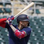 
              Minnesota Twins' Carlos Correa looks for a pitch during baseball batting practice at Hammond Stadium Wednesday, March 23, 2022, in Fort Myers, Fla.  (AP Photo/Steve Helber)
            
