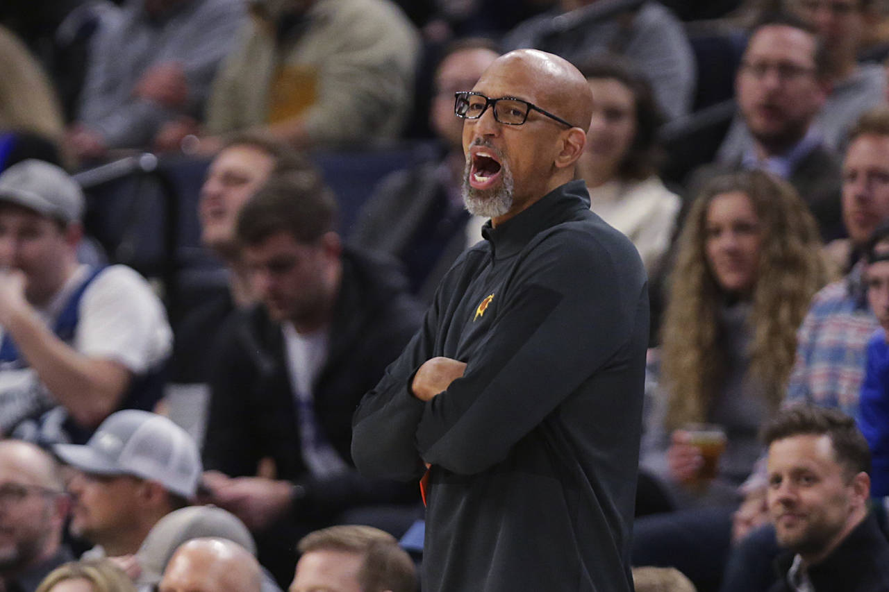 Phoenix Suns coach Monty Williams yells during the first half of the team's NBA basketball game aga...