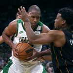 
              Boston Celtics center Al Horford, left, is pressured by Miami Heat guard Kyle Lowry during the first half of an NBA basketball game Wednesday, March 30, 2022, in Boston. (AP Photo/Charles Krupa)
            