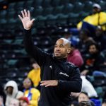 
              St. Peter's head coach Shaheen Holloway gestures to his team in the first half of an NCAA college basketball game against Monmouth during the championship of the Metro Atlantic Athletic Conference tournament, Saturday, March 12, 2022, in Atlantic City, N.J. (AP Photo/Matt Rourke)
            