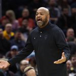 
              Cleveland Cavaliers head coach J.B. Bickerstaff questions a call during the second half of an NBA basketball game against the Toronto Raptors, Sunday, March 6, 2022, in Cleveland. (AP Photo/Ron Schwane)
            