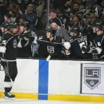 
              Los Angeles Kings center Quinton Byfield (55) celebrates with teammates after scoring during the third period of an NHL hockey game against the Nashville Predators Tuesday, March 22, 2022, in Los Angeles. (AP Photo/Ashley Landis)
            