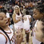 
              Texas players react on the court after they beat Ohio State 66-63 in a college basketball game in the Sweet 16 round of the NCAA tournament, Friday, March 25, 2022, in Spokane, Wash. (AP Photo/Young Kwak)
            