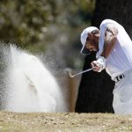 
              Brooks Koepka hits out of a bunker on the sixth fairway in the second round of the Dell Technologies Match Play Championship golf tournament, Thursday, March 24, 2022, in Austin, Texas. (AP Photo/Tony Gutierrez)
            