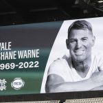 
              A tribute for cricket legend Shane Warne is displayed on the big screens at the Melbourne Cricket Ground in Melbourne, Australia, Saturday, March 5, 2022. Warne, widely regarded as one of the greatest players, most astute tacticians and ultimate competitors in the long history of cricket, has died of a suspected heart attack Friday, March 4, 2022 in Koh Samui, Thailand. He was 52. (AP Photo/Asanka Brendon Ratnayake)
            