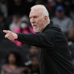 
              San Antonio Spurs coach Gregg Popovich signals to players during the first half of an NBA basketball game against the Utah Jazz, Friday, March 11, 2022, in San Antonio. (AP Photo/Eric Gay)
            