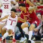 
              Wisconsin's Johnny Davis (1) and Nebraska's Trey McGowens (2) go after a loose ball during the first half of an NCAA college basketball game Sunday, March 6, 2022, in Madison, Wis. (AP Photo/Andy Manis)
            