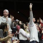
              Spectators in the Washington State student section celebrate during the second half of the team's NCAA college basketball game against Oregon State, Thursday, March 3, 2022, in Pullman, Wash. Washington State won 71-67. (AP Photo/Young Kwak)
            