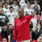 
              Maryland head coach Danny Manning signals during the first half of an NCAA college basketball game against Michigan State, Sunday, March 6, 2022, in East Lansing, Mich. (AP Photo/Carlos Osorio)
            