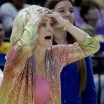 
              LSU head coach Kim Mulkey reacts to a call during the second half of a women's college basketball game against Ohio State in the second round of the NCAA tournament, Monday, March 21, 2022, in Baton Rouge, La. (AP Photo/Matthew Hinton)
            