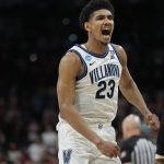 
              Villanova forward Jermaine Samuels celebrates after their win against Houston during a college basketball game in the Elite Eight round of the NCAA tournament on Saturday, March 26, 2022, in San Antonio. (AP Photo/David J. Phillip)
            