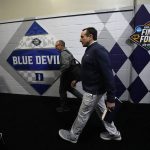 
              Duke head coach Mike Krzyzewski walks to the locker room after practice ahead of the men's Final Four NCAA college basketball tournament Thursday, March 31, 2022., in New Orleans. Duke will play North Carolina on Saturday. (AP Photo/Gerald Herbert)
            