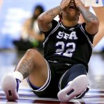 
              Stephen F. Austin guard Zya Nugent (22) reacts after being called for a blocking foul at half court against North Carolina during a first-round game in the NCAA women's college basketball tournament Saturday, March 19, 2022, in Tucson, Ariz. (Rebecca Sasnett/Arizona Daily Star via AP)
            