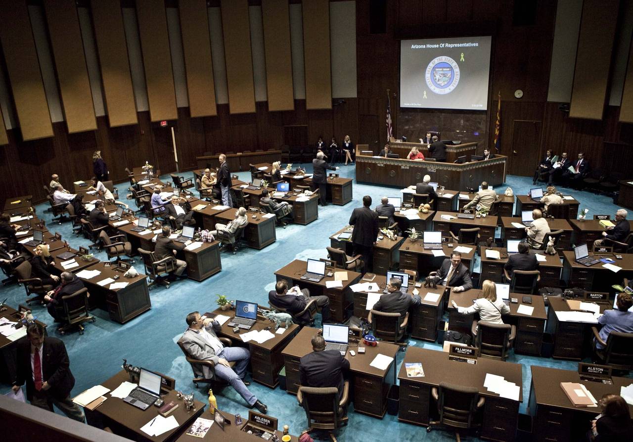 FILE - The Arizona House of Representatives gather during a legislative session Wednesday, April 6,...