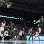 
              Duke forward Paolo Banchero shoots over Michigan State forward Joey Hauser during the first half of a college basketball game in the second round of the NCAA tournament on Sunday, March 20, 2022, in Greenville, S.C. (AP Photo/Chris Carlson)
            