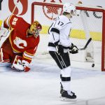 
              Los Angeles Kings centre Lias Andersson (17) scores on Calgary Flames goalie Jacob Markstrom during shootout in NHL hockey game Thursday, March 31, 2022, in Calgary, Alberta. (Jeff McIntosh/The Canadian Press via AP)
            