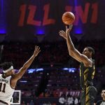 
              Iowa's Kris Murray, front right, takes a jump shot as Illinois' Alfonso Plummer (11) defends during the second half of an NCAA college basketball game Sunday, March 6, 2022, in Champaign, Ill. (AP Photo/Michael Allio)
            