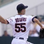 
              Minnesota Twins relief pitcher Taylor Rogers (55) delivers a pitch in the top of the fourth inning during a spring training baseball game against the Pittsburgh Pirates at the Hammond Stadium Wednesday March 30, 2022, in Fort Myers, Fla. (AP Photo/Steve Helber)
            