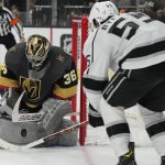 
              Los Angeles Kings center Quinton Byfield (55) attempts a shot on Vegas Golden Knights goaltender Logan Thompson (36) during the first period of an NHL hockey game Saturday, March 19, 2022, in Las Vegas. (AP Photo/John Locher)
            