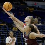 
              Ohio State guard Jacy Sheldon (4) fouls Missouri State guard Mariah White (14) while going for a rebound in the first half of a women's college basketball game in the first round of the NCAA tournament, Saturday, March 19, 2022, in Baton Rouge, La. (AP Photo/Matthew Hinton)
            