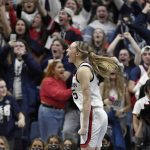 
              Connecticut's Paige Bueckers reacts at the end of a second-round women's college basketball game against Central Florida in the NCAA tournament, Monday, March 21, 2022, in Storrs, Conn. (AP Photo/Jessica Hill)
            
