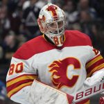 
              Calgary Flames goaltender Dan Vladar prepares for action in the first period of an NHL hockey game against the Colorado Avalanche, Sunday, March 13, 2022, in Denver. (AP Photo/David Zalubowski)
            