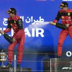 
              First placed Ferrari driver Charles Leclerc of Monaco, right, and second placed Ferrari driver Carlos Sainz of Spain celebrate on the podium after the Formula One Bahrain Grand Prix it in Sakhir, Bahrain, Sunday, March 20, 2022. (AP Photo/Hassan Ammar)
            