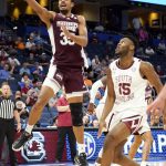 
              Mississippi State forward Tolu Smith (35) gets past South Carolina forward Wildens Leveque (15) to shoot during the first half of an NCAA men's college basketball game at the Southeastern Conference tournament in Tampa, Fla., Thursday, March 10, 2022. (AP Photo/Chris O'Meara)
            