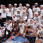 
              Louisville poses after beating Michigan 62-50 in a college basketball game in the Elite 8 round of the NCAA women's tournament Monday, March 28, 2022, in Wichita, Kan. (AP Photo/Jeff Roberson)
            