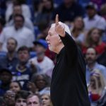 
              San Antonio Spurs head coach Gregg Popovich calls out from the bench in the second half of an NBA basketball game against the New Orleans Pelicans in New Orleans, Saturday, March 26, 2022. The Spurs won 107-103. (AP Photo/Gerald Herbert)
            