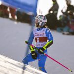
              Italy's Marta Bassino stands on the slope after failing to complete the first run of an alpine ski, women's World Cup giant slalom, in Lenzerheide, Switzerland, Sunday, March 6, 2022.  (Jean-Christophe Bott/Keystone via AP)
            